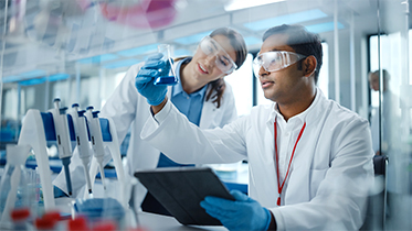 Two people working in a lab